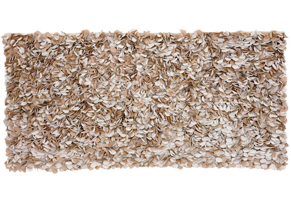 Una alfombra como cabecero