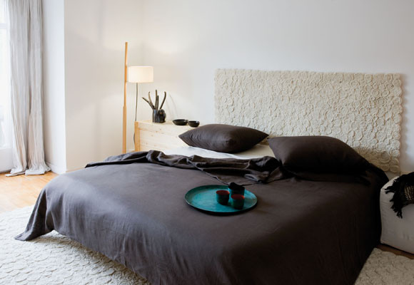 Una alfombra como cabecero