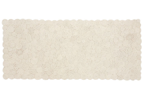 Una alfombra como cabecero