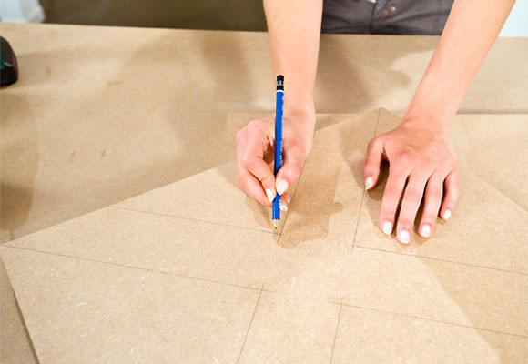 Un revistero en forma de X