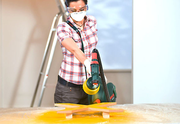 Un revistero en forma de X