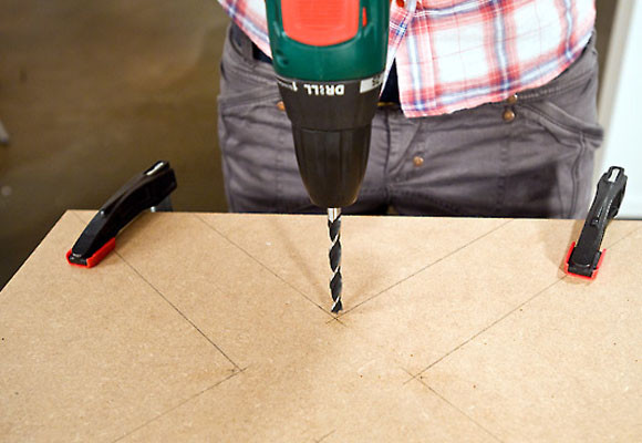 Un revistero en forma de X