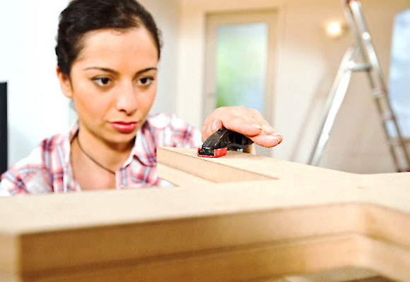 Un revistero en forma de X