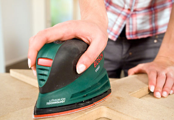 Un revistero en forma de X