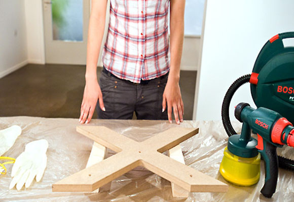 Un revistero en forma de X