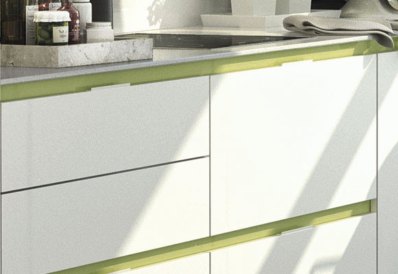 Una cocina con toques de verde