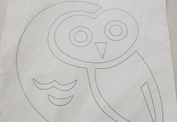 Un bonito cojín búho con stencil